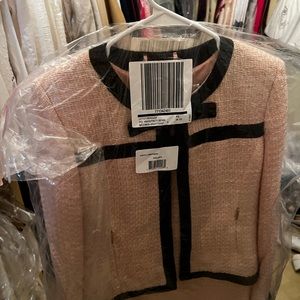Karl Lagerfeld pink tweed Chanel style jacket.